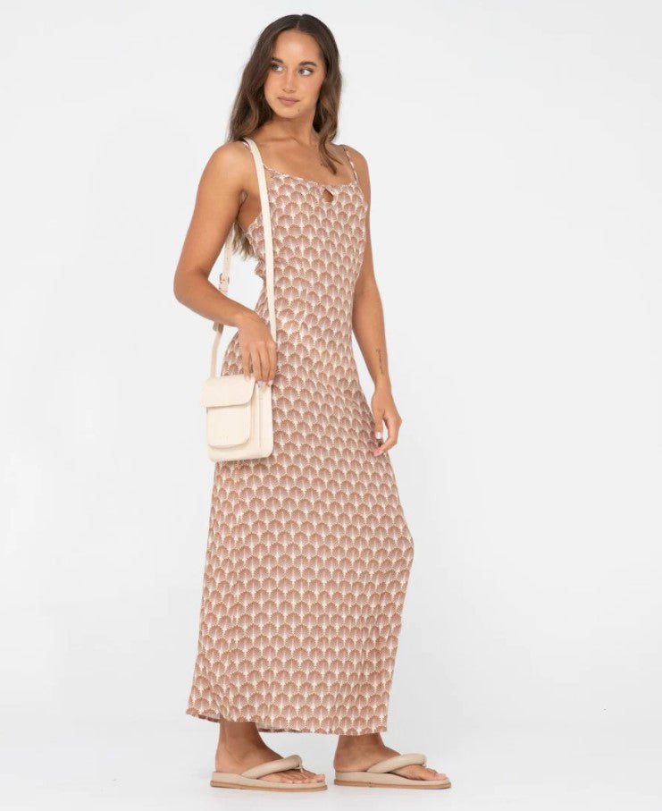 Rusty Mila woven Sidebag in cocnut cream colour being worn over the shoulder by a model
