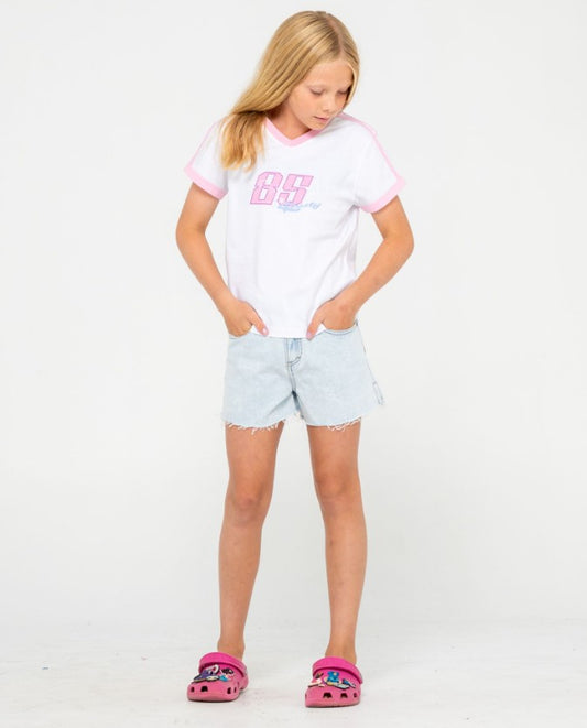 Rusty Penny Kick Flare Girls Denim Shorts in sky blue heather on model in white t-shirt from the front