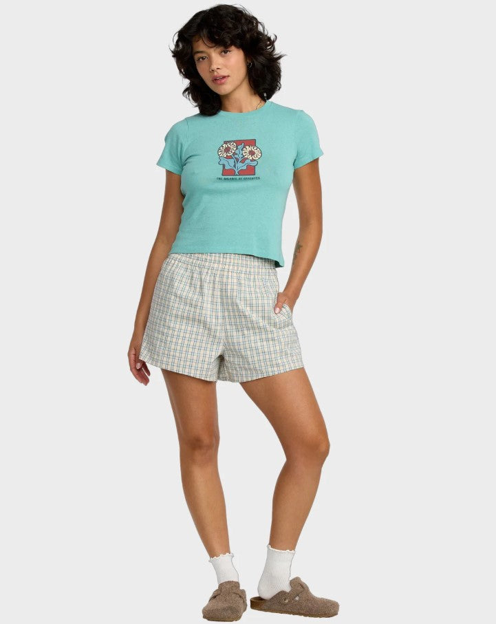 RVCA 411 Women's Tee in sky blue on model in checked shorts from front