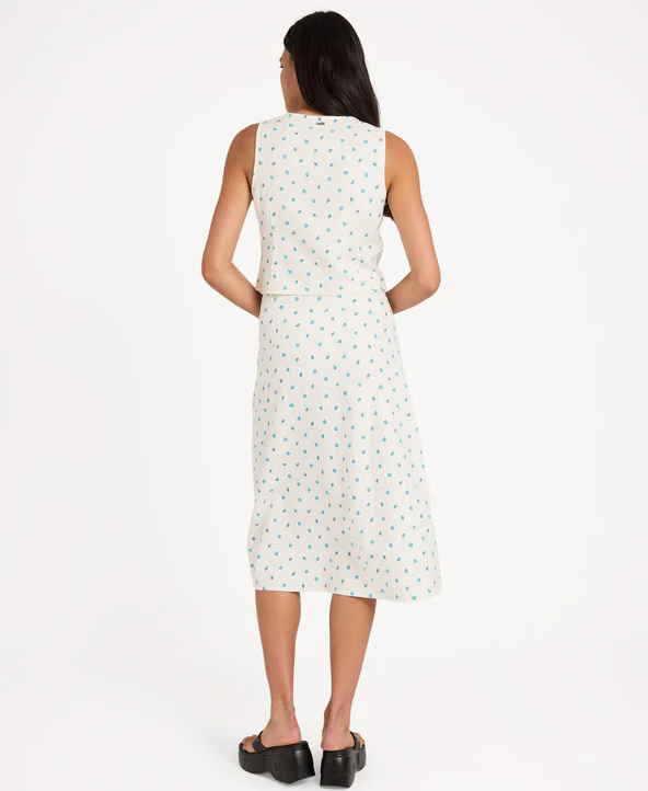 RVCA Rose Bud Annika Midi Skirt in white with floral print on model from rear