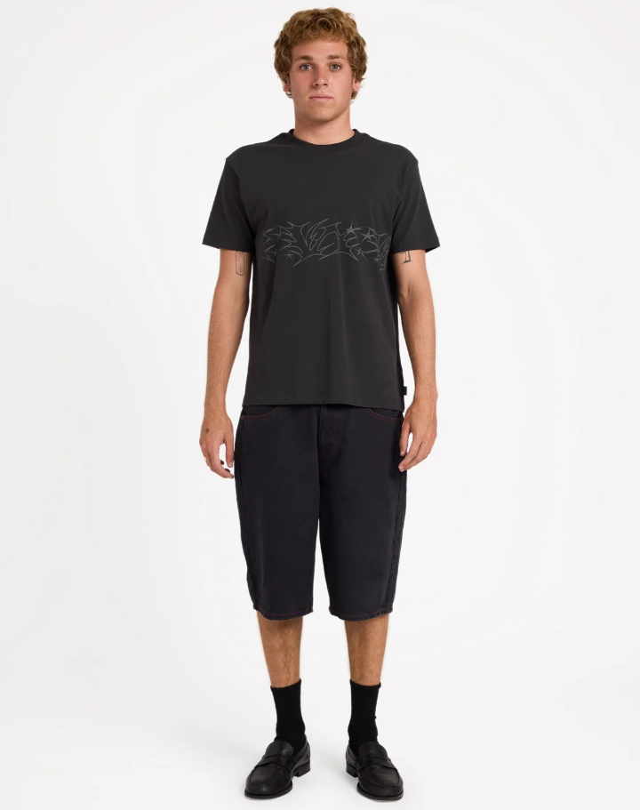 RVCA Dayshift 23.5" Baggy Denim Shorts in black on model from front