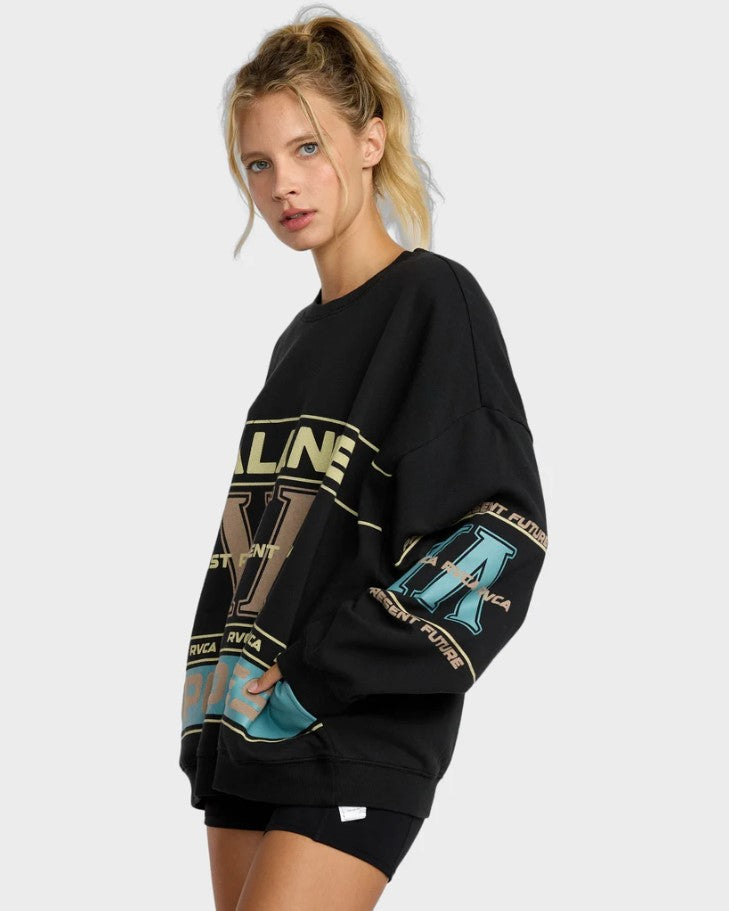 RVCA Puck It Pullover Crew Womens Sweatshirt in black on blonde model from side