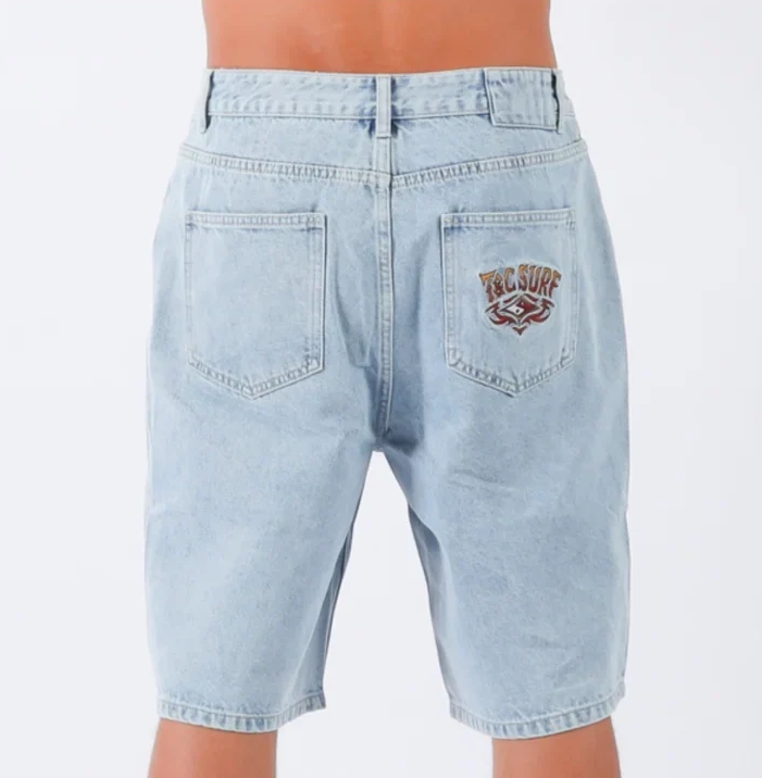 T & C Thrift Boys Denim Shorts in washed blue on model from the rear