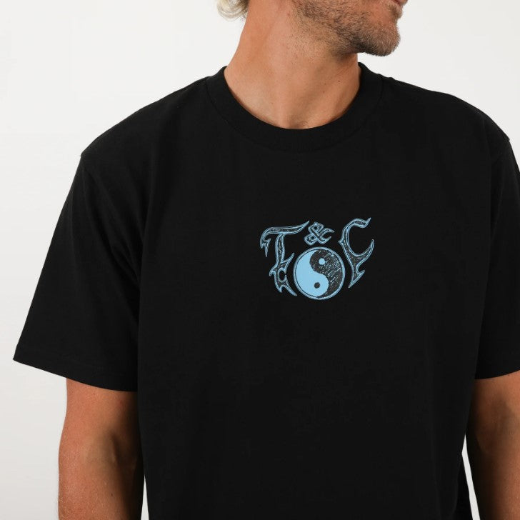 black shirt with blue T & C ying yang design in front middle