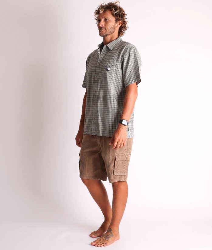 Town and Country Barrack Cord Shorts in sand colourway on model wearing check shirt