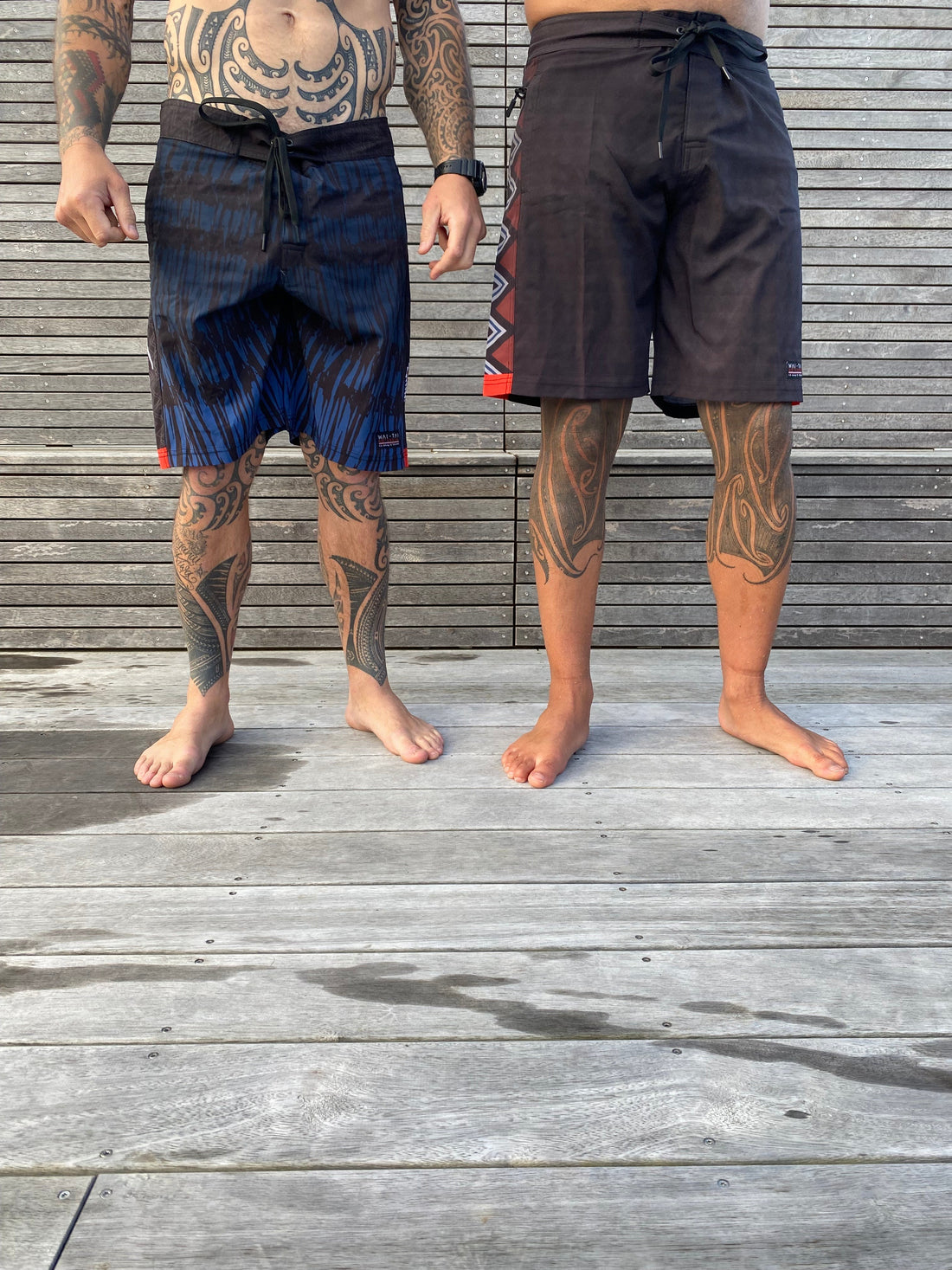 Wai-Tai Piu and Taniwha Maori boardshorts side by side from the front