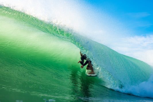 Beautiful clear photo showing Bobby Hansen surfing in a barrel at Wainui Beach GIsborne