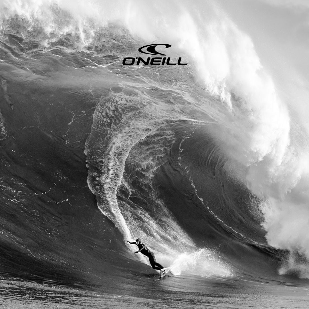 O'Neill winter wetsuits Hyperfire X wetsuit on a surfer on a big slabbing wave