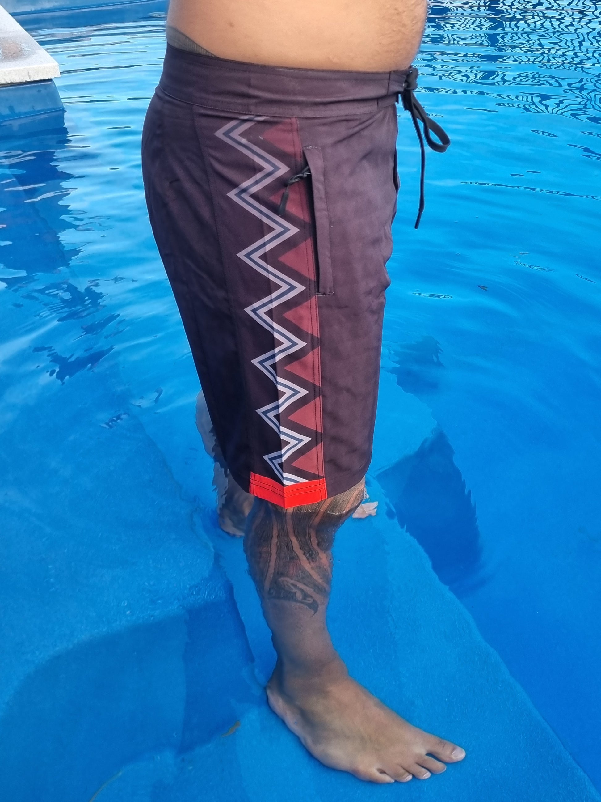 Wai-Tai Aotearoa Taniwha 4 Way Stretch Maori Boardshorts from side