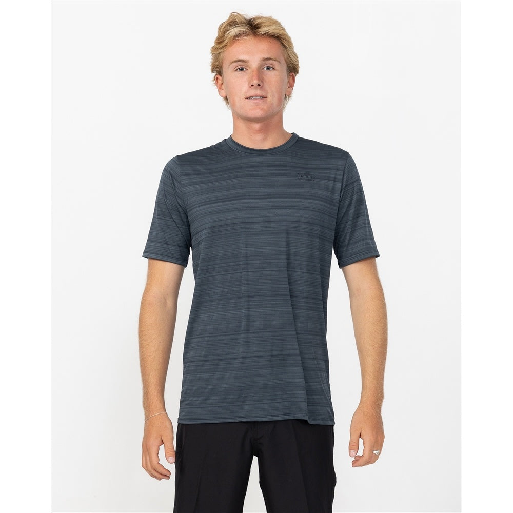 O'Neill 24/7 Tech Short Sleeve Surf Rash Tee in graphite colourway on model in black shorts from the front close up
