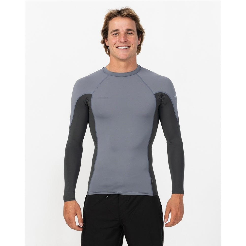 O'Neill Hyperfreak Skins Long Sleeve Rash Guard in dark shadow colourway on model in black boardshorts from front close up