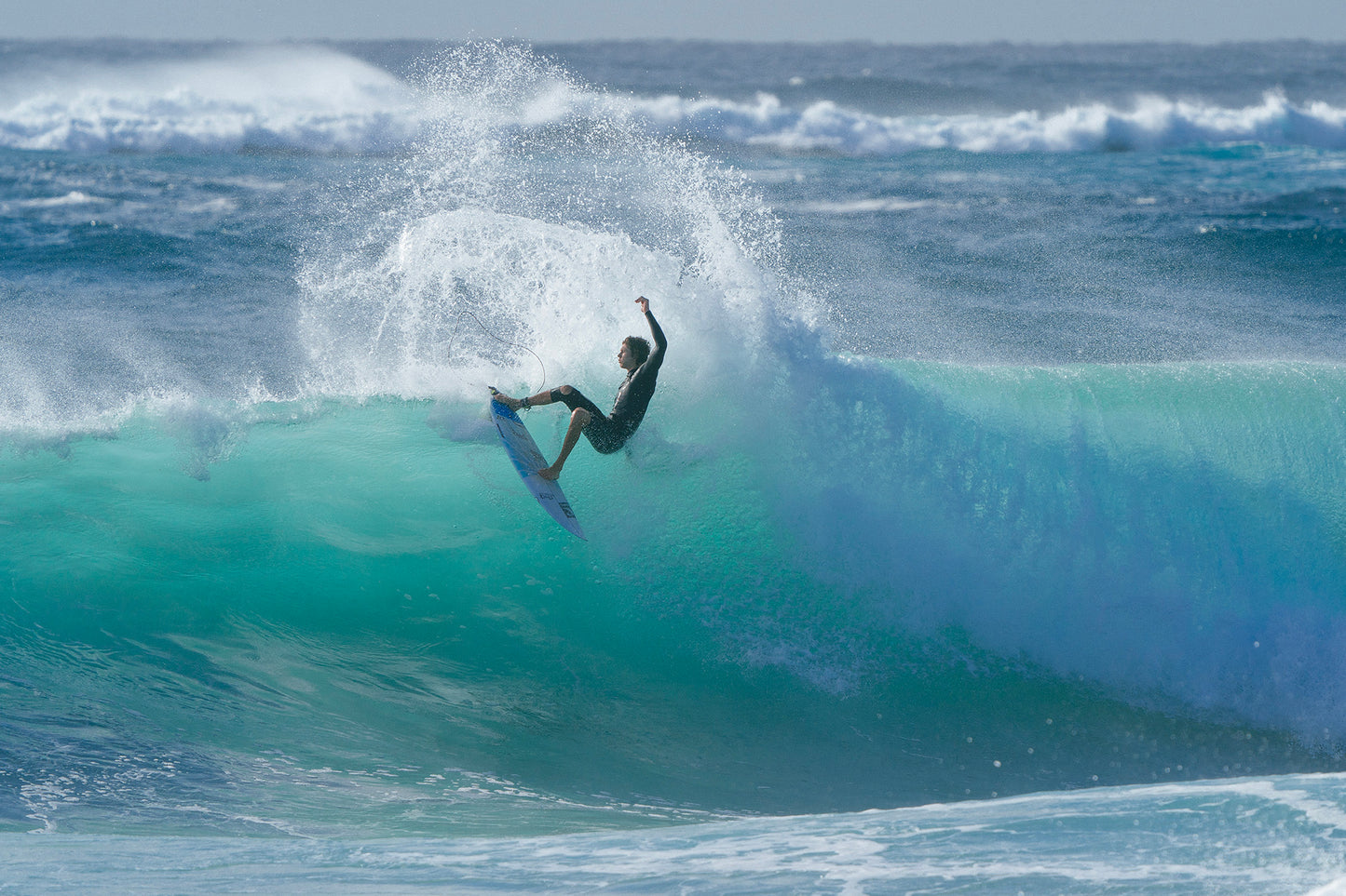 O'Neill Hyperfreak 2mm Long Sleeve CS Wetsuit surfer doing a layback snap