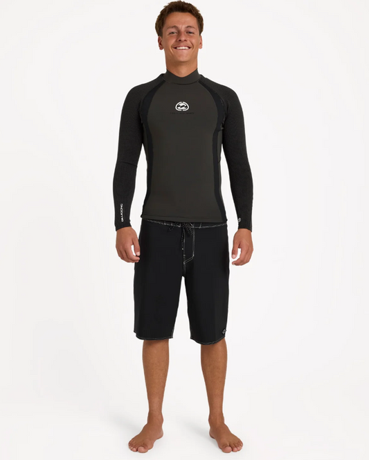 Billabong 1mm Ultra Long Sleeve Wetsuit Vest in black on model from the front