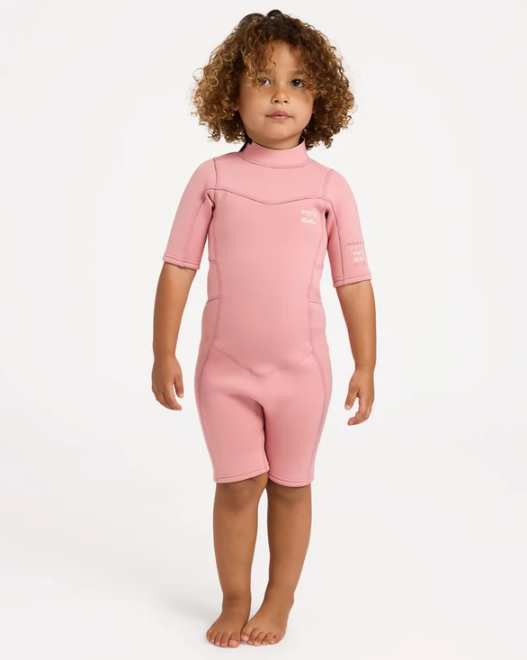 Billabong 2/2mm Absolute Spring Toddler Wetsuit in french rose colourway on model from the front