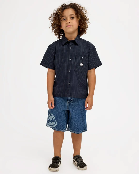 Billabong Spec 73 Groms (2-7) Denim Shorts in ocean wash blue colourway on kid in checked shirt from the front