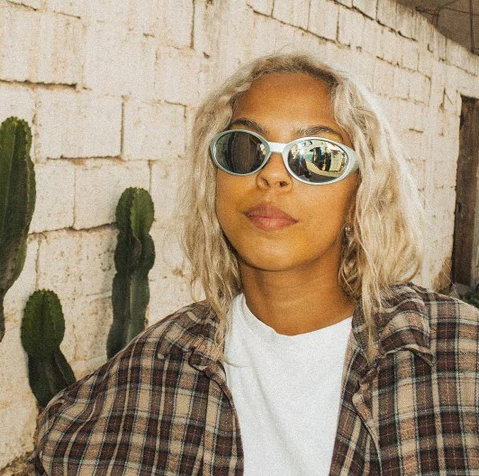 CHPO Brand Nori Unisex Sunglasses in silver colourway on blonde model outside