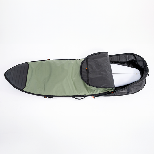 FCS 6'3 Go-Light Day Runner Shortboard Cover in alpine green with black showing open tail