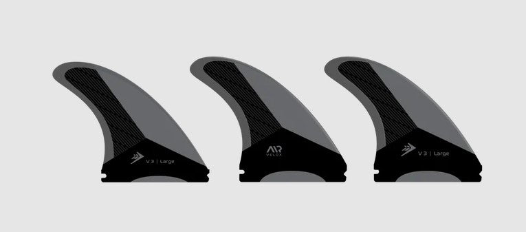 Firewire Velox Thruster Fin Set (large) - Single Tab surfboard fin set in black and grey