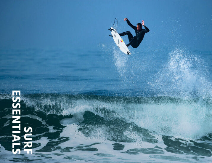 Jordy Smith doing a huge aerial on his surfboard in his O'Neill wetsuit
