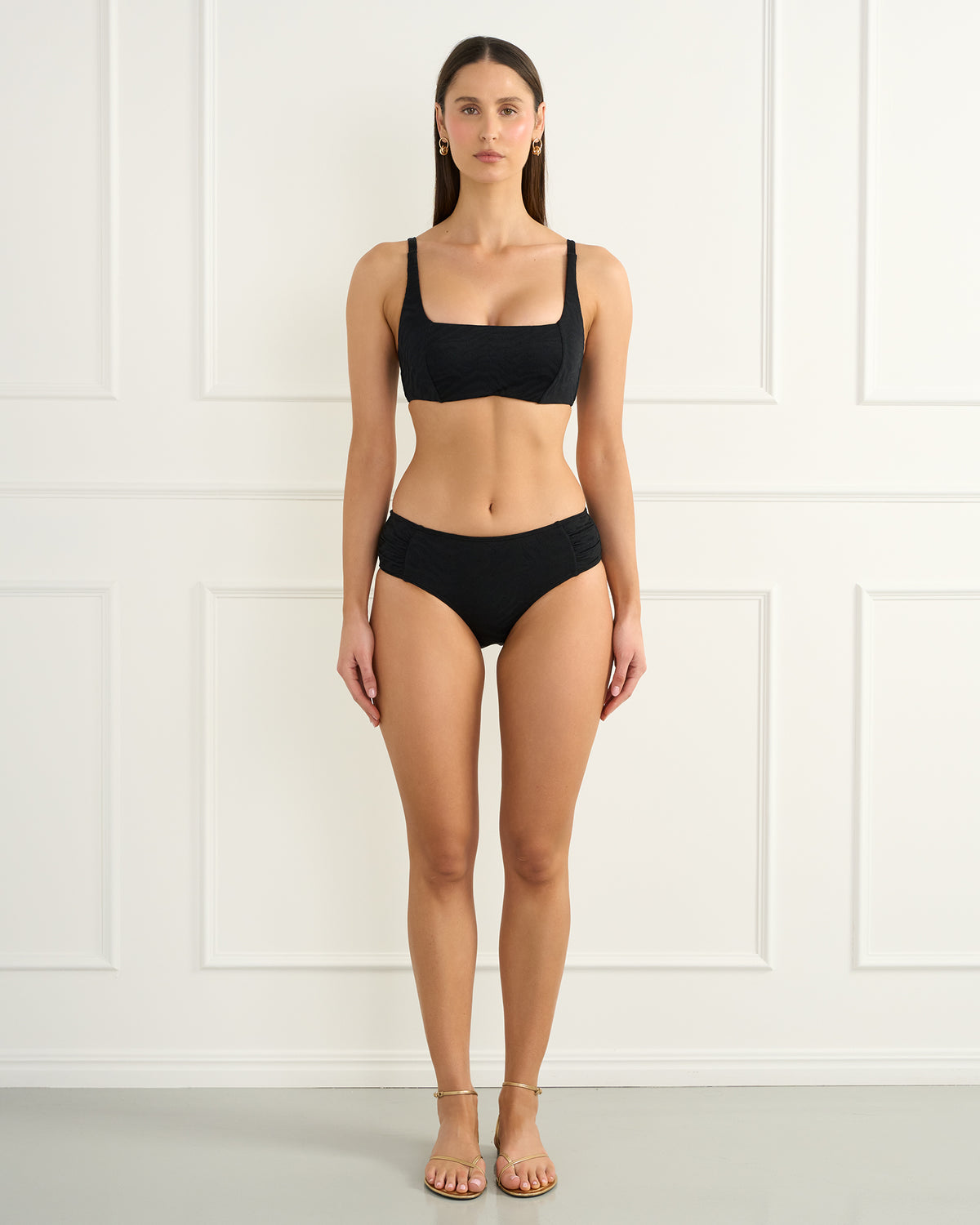 Heaven Swimwear Sophia Crop with Emma Surf Pant Bikini in black on model from the front