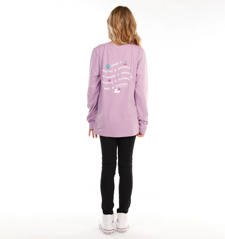 Hello Stranger Besties Girls Long Sleeve Tee in purple on model in hello stranger black leggings from rear angle