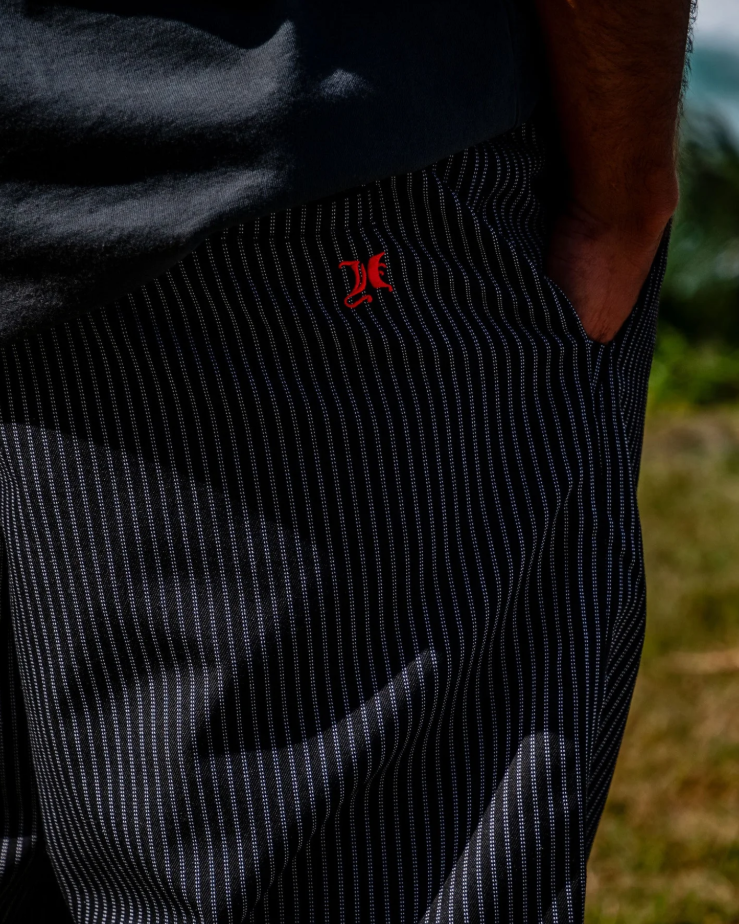 Hurley Rivingston 22" Walkshorts in black stripe with red Hurley embroidered logo close up from the back