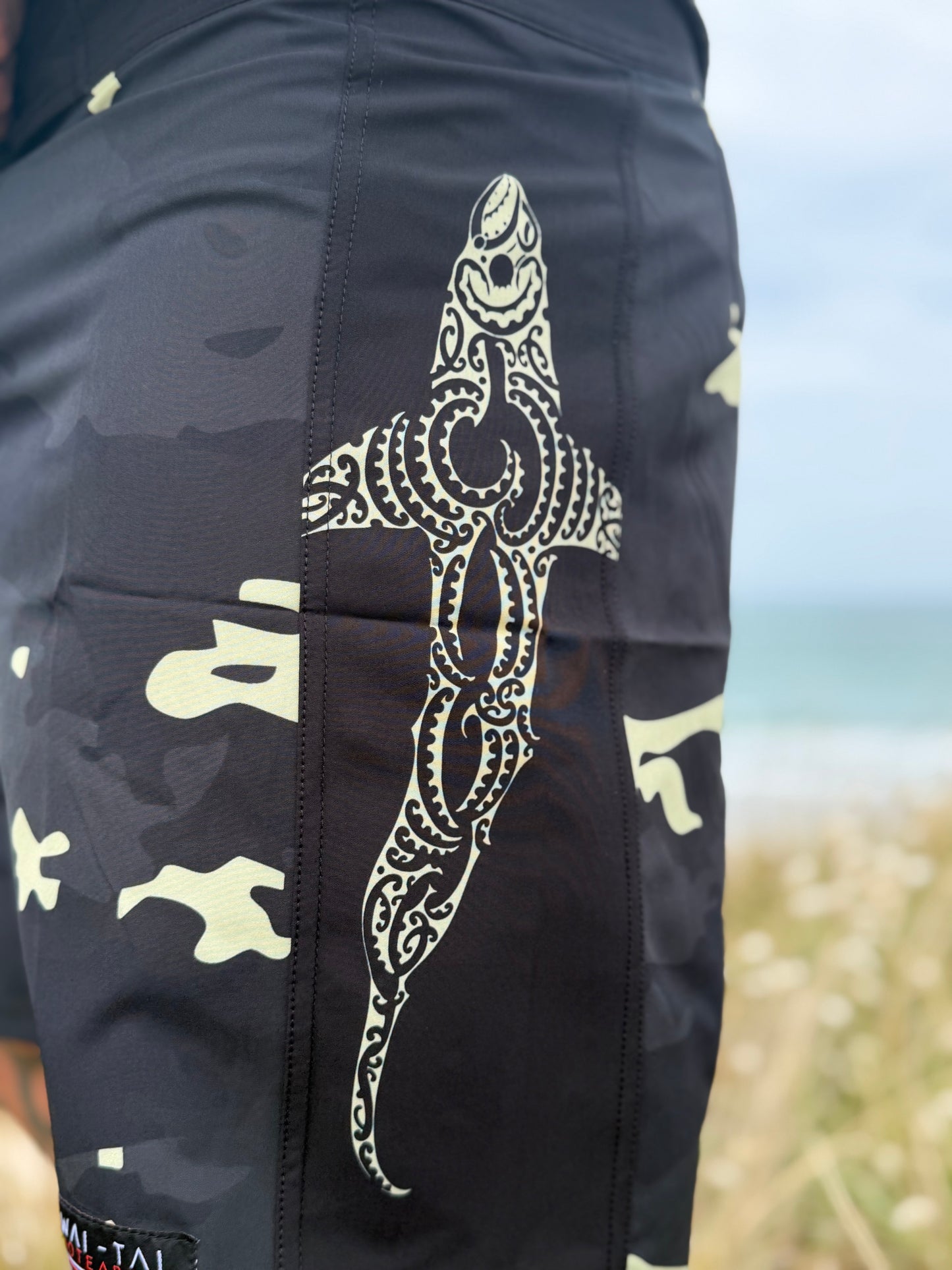 Wai-Tai Aotearoa Kaitiaki Yellow Camo 19" Tech Boardshorts from side