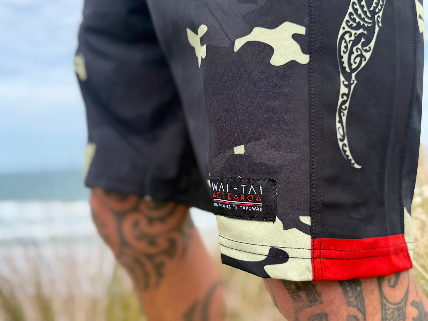 Wai-Tai Aotearoa Kaitiaki Yellow Camo 19" Tech Boardshorts close up