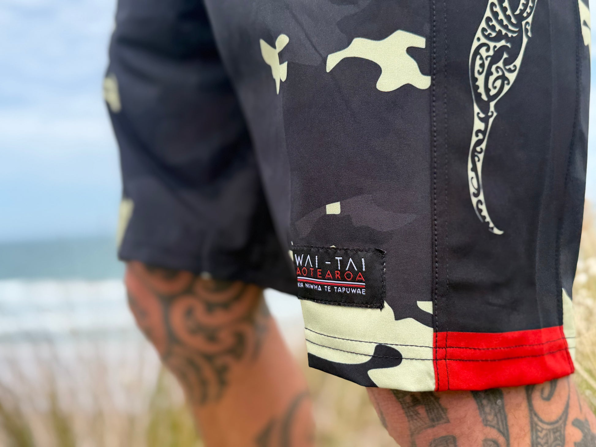 Wai-Tai Aotearoa Kaitiaki Yellow Camo 19" Tech Boardshorts close up