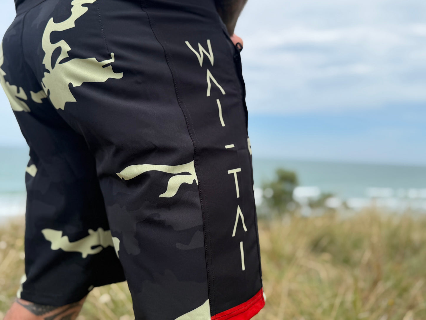 Wai-Tai Aotearoa Kaitiaki Yellow Camo 19" Tech Boardshorts from rear