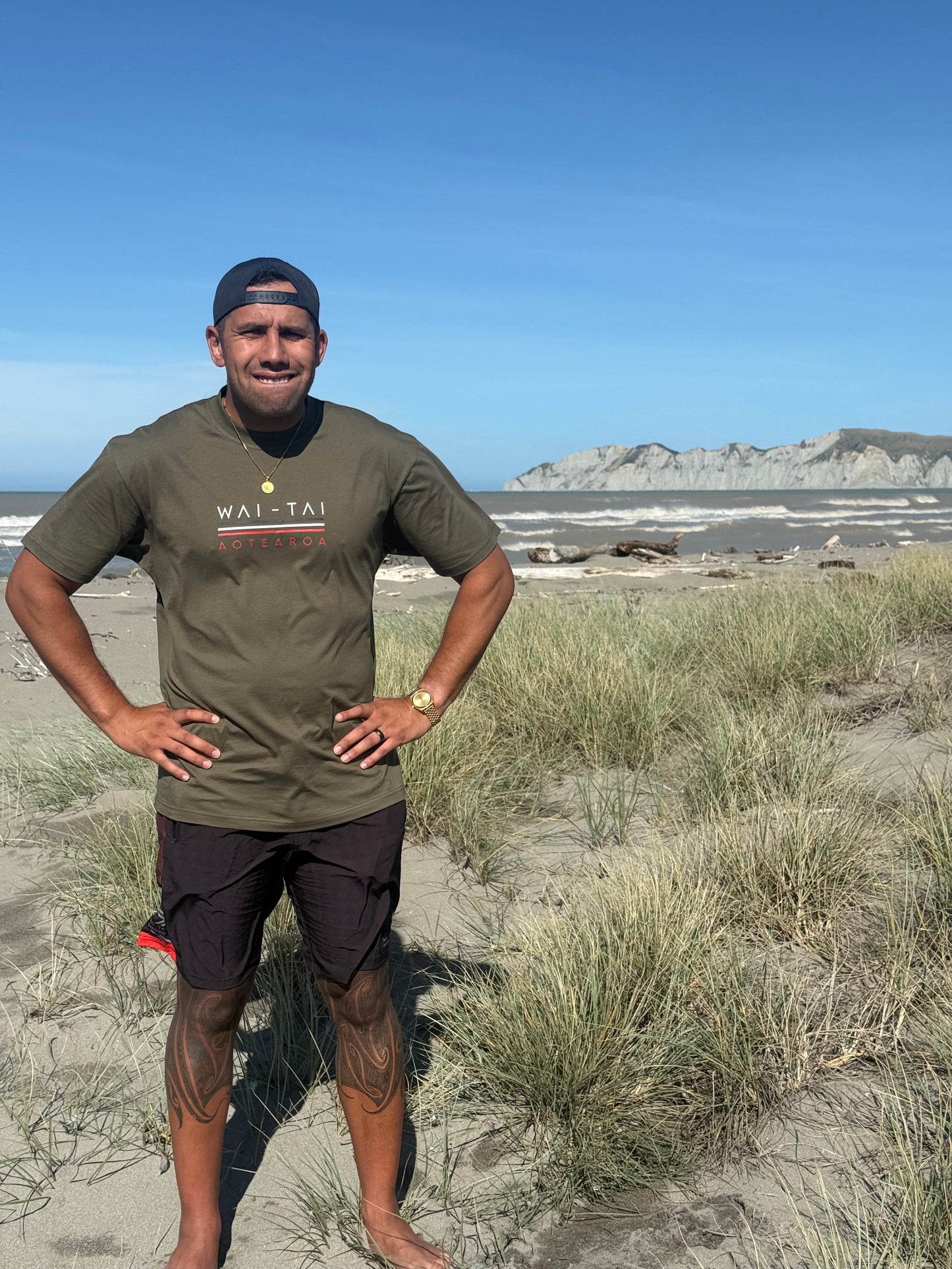 Wai-Tai Aotearoa Mens Taniwha Tee in dark olive from front