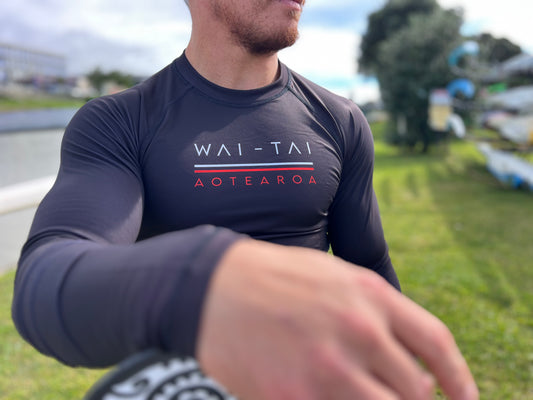 Wai-Tai Aotearoa Patiki Thermal Longsleeve Rash Top from front in black