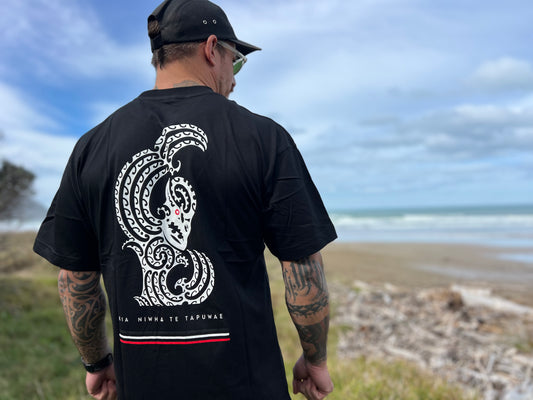 Wai-Tai Aotearoa Taniwha Maori t-shirt worn by Maia Gibbs in Gisborne from the back