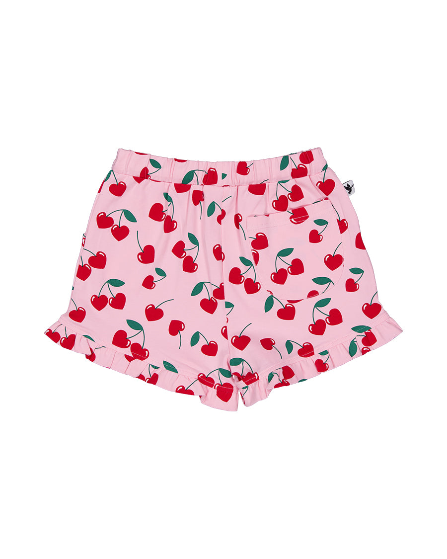 Kissed By Radicool Cherries Girls Frill Shorts in pink from rear flat lay