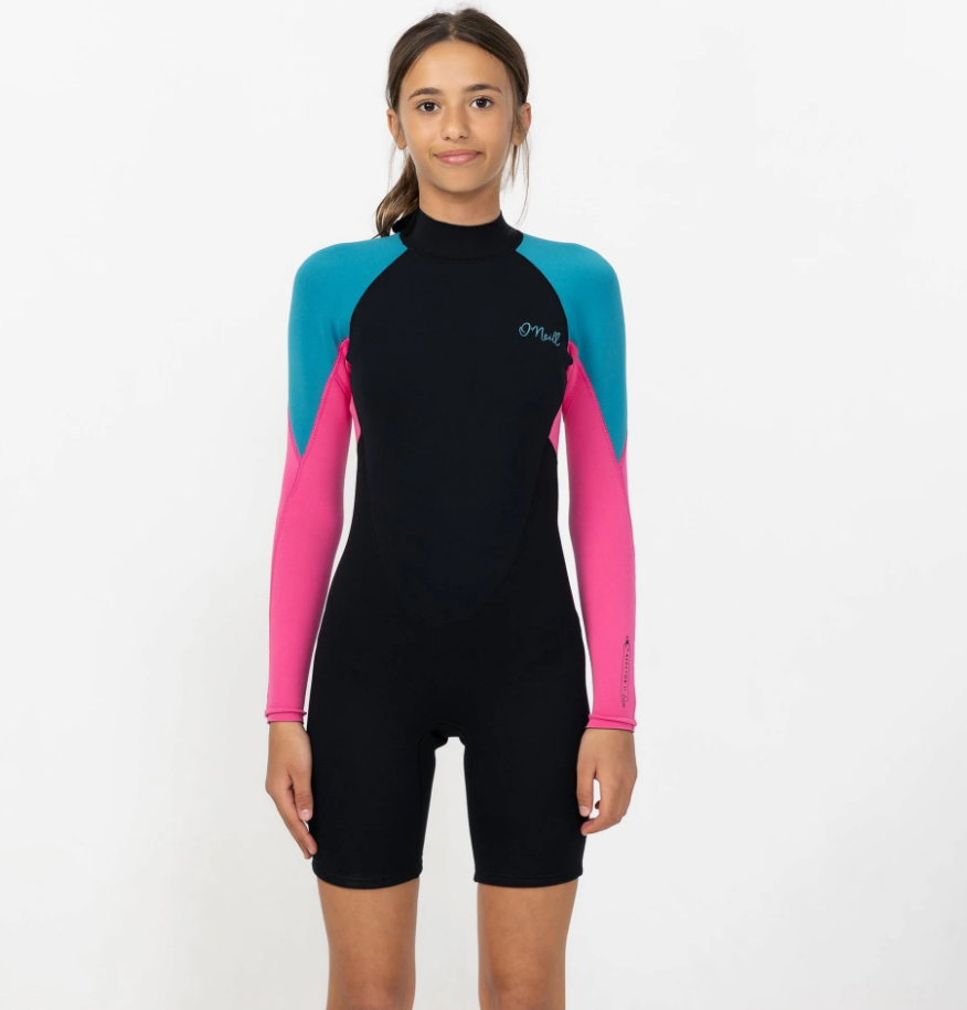 O'Neill Girls 2mm Reactor 2 Long Sleeve Spring Wetsuit in blue curacao colourway with black body and legs, blue shoulders and pink arms on model from the front
