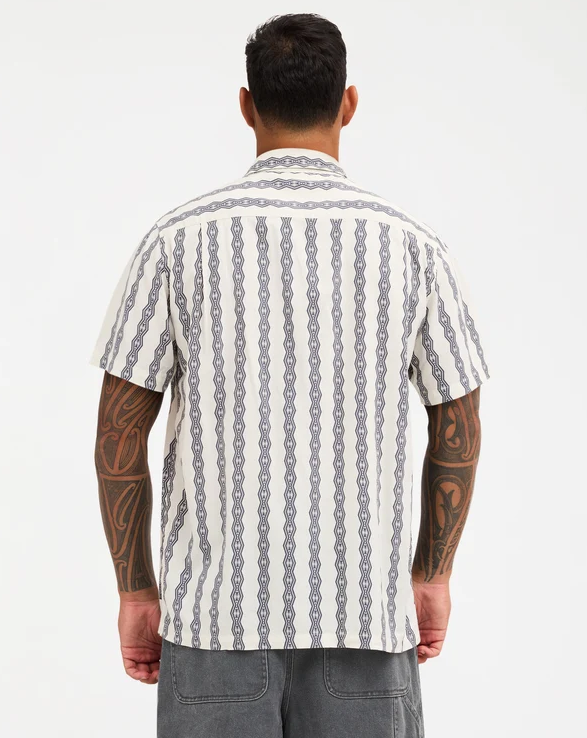 Quiksilver Tai Kehu Tohu Men's Maori Short Sleeve Shirt in birch colourway on Kehu Butler from the back