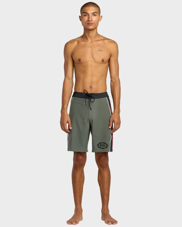 RVCA Retract 20" Boardshorts in olive colourway on model full length from front