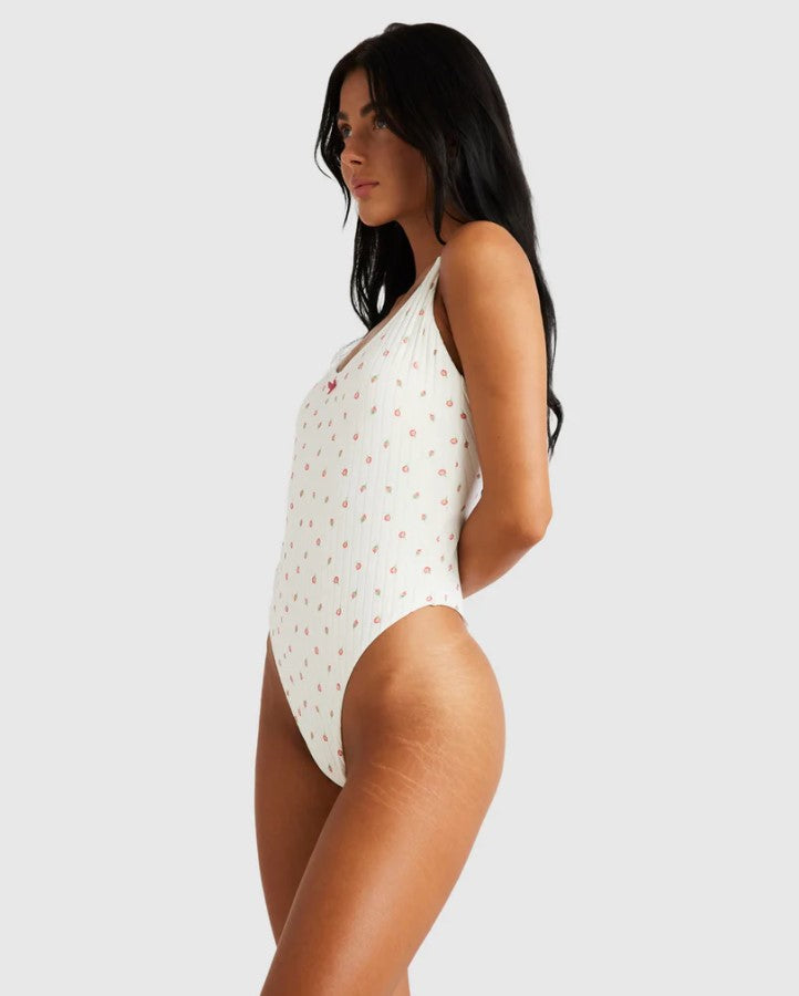 RVCA Rose Bud One Piece Swimwear in white with roses on model from side