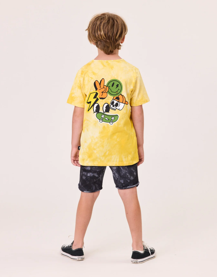 Radicoool Kids Tie Dye Skater Tee in tie dye yellow on model from the back