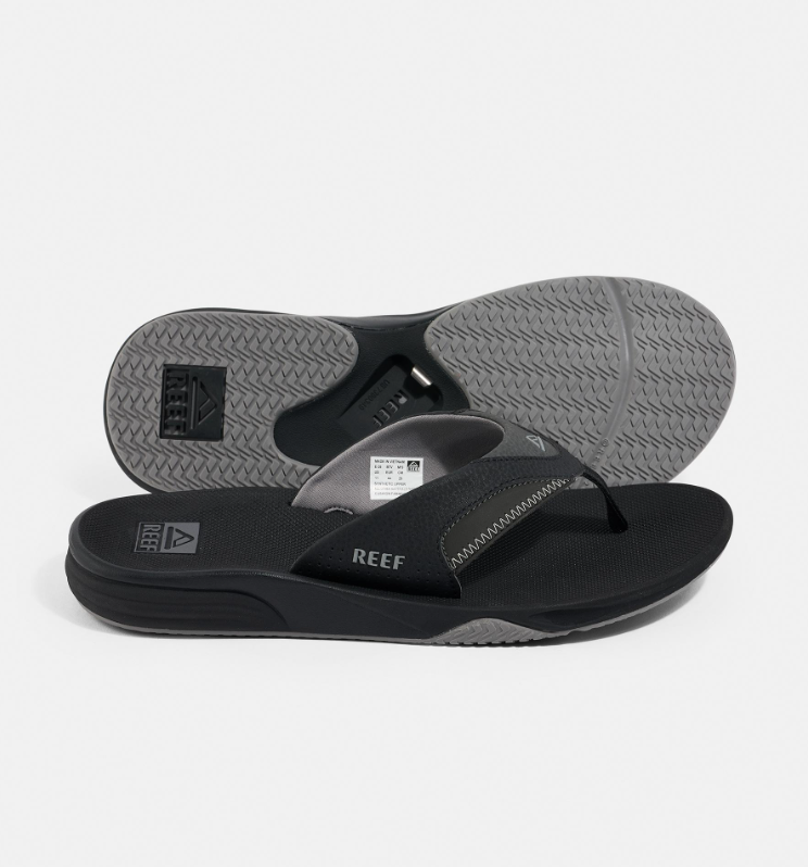 Reef Cushion Fanning Jandals
  in black with grey trim showing a pair with side and bottom view
