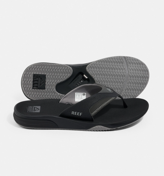 Reef Cushion Fanning Jandals
  in black with grey trim showing a pair with side and bottom view