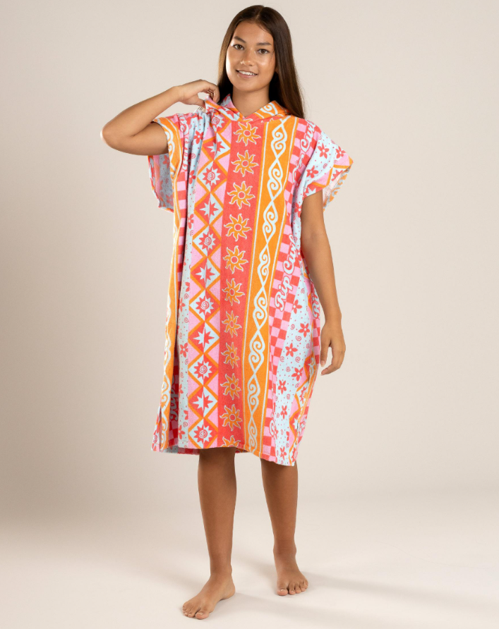 Rip Curl Girls Mixed Cotton Hooded Towel on teen girl in red/sunset colours - front 