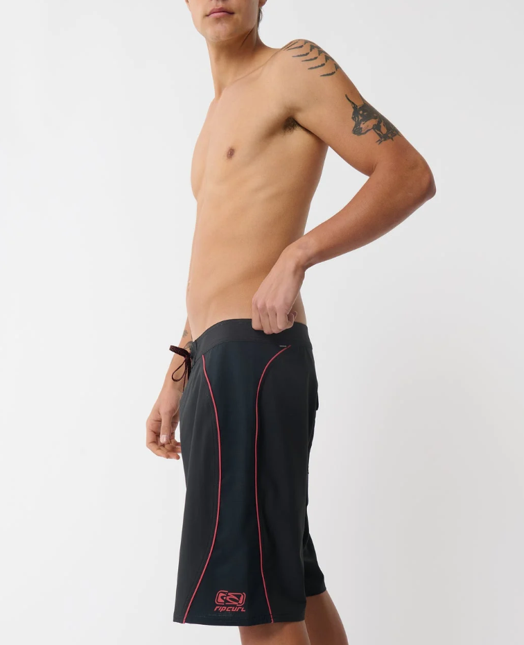 Rip Curl Mirage Archive Bender 21" Boardshorts in black with red detail on model from the side