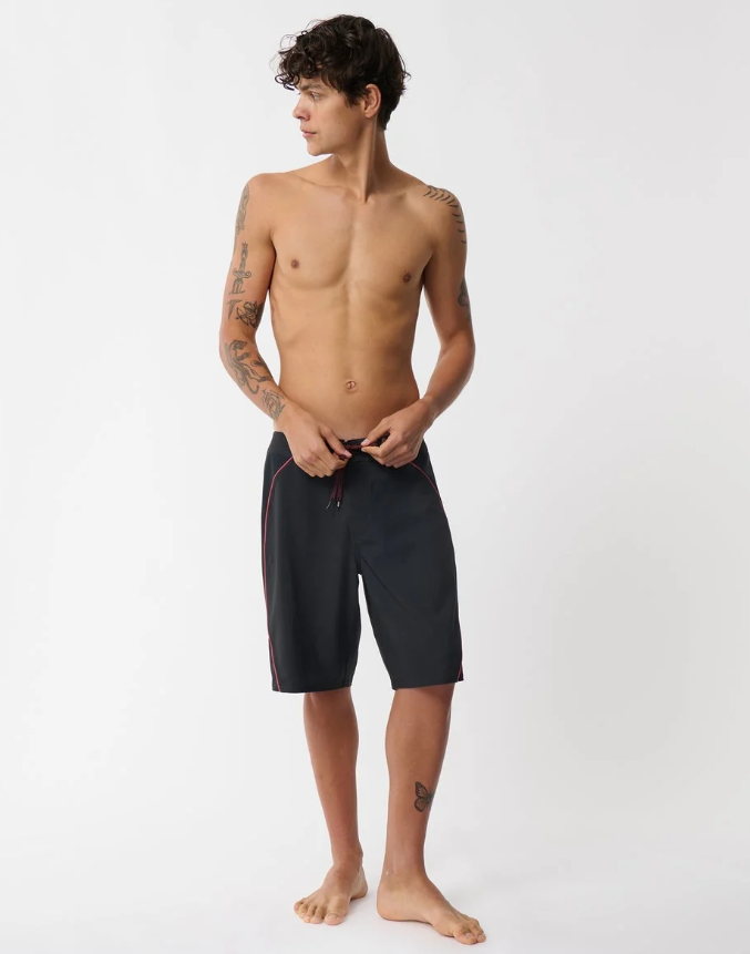 Rip Curl Mirage Archive Bender 21" Boardshorts in black with red detail on model from the front