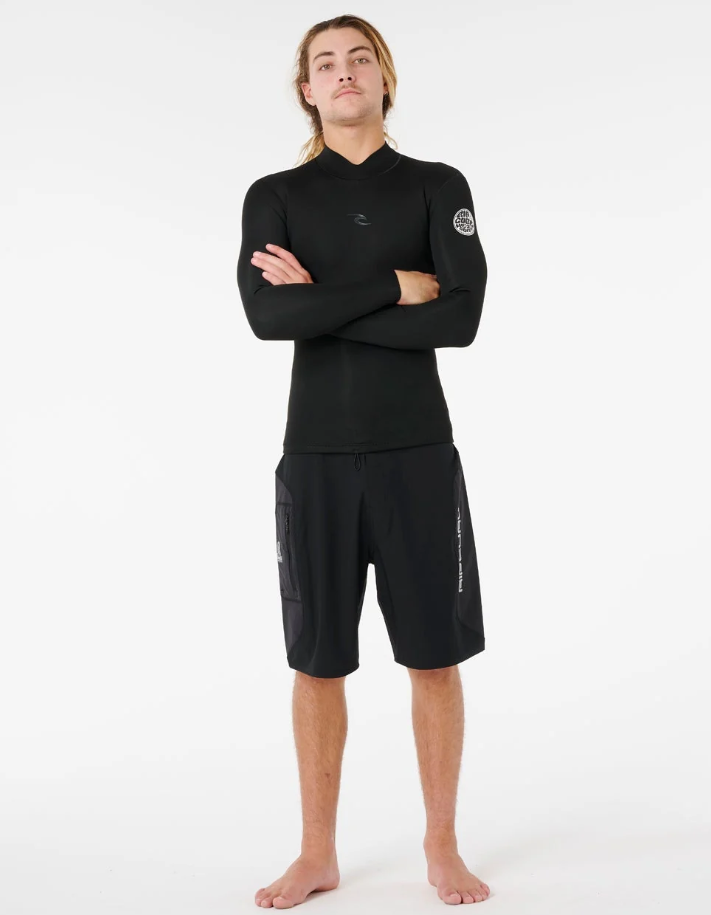 Rip Curl Dawn Patrol 1.5mm Long Sleeve Wetsuit Jacket in black on model in black boardshorts from front