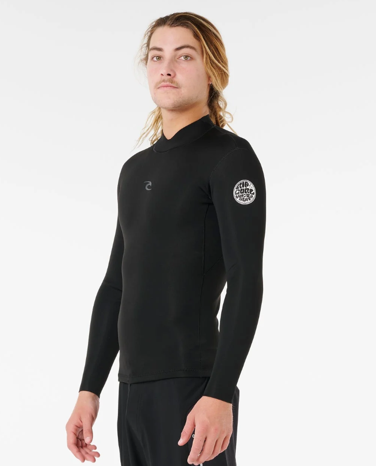 Rip Curl Dawn Patrol 1.5mm Long Sleeve Wetsuit Jacket in black on model in black boardshorts from left side