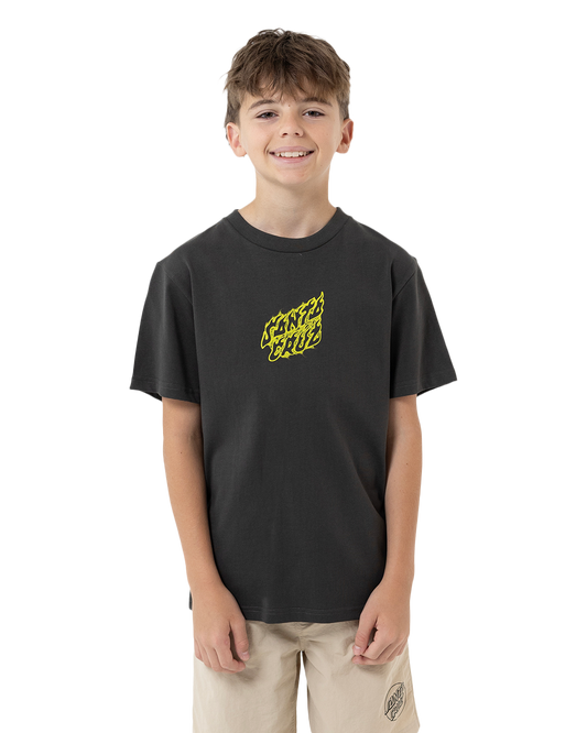 Child wearing a black t-shirt with a yellow logo on a white background