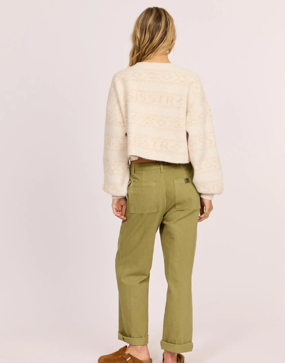 Sisstrevolution Costa Del Sol Sweater in buttermilk colourway on model from  rear