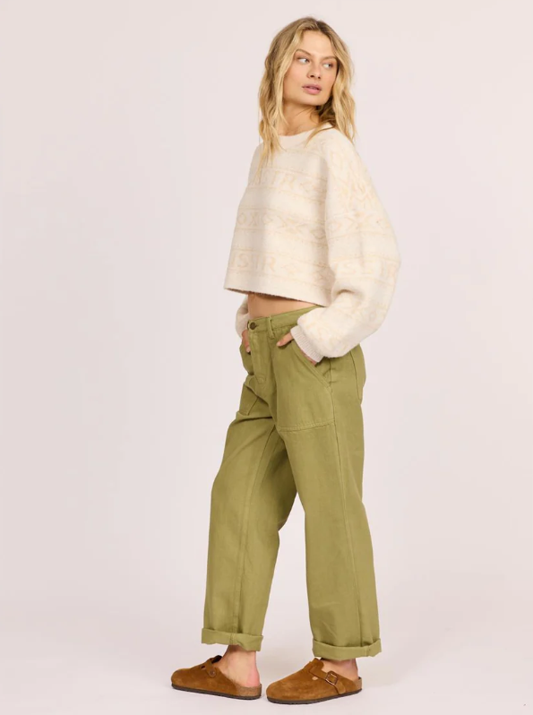 Sisstrevolution Costa Del Sol Sweater in buttermilk colourway on model from side