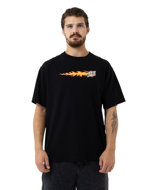 Man wearing a black t-shirt with a flame design and text on a white background